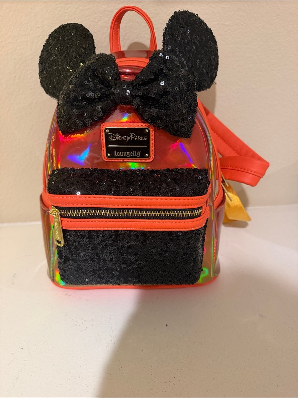 Loungefly Kids Iridescent Orange Mini Backpack with Black Sequin Bow & Ears
